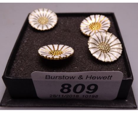 Anton Michelsen, silver and enamel daisy pattern earrings, together with another similar silver pair