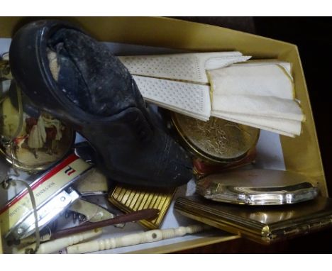 A shoe pin cushion, compacts, and a keyring lighter etc