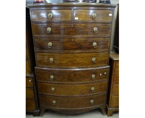 A George III mahogany and satinwood strung bow-front chest on chest, brass ring drop handles, on bracket feet, W115cm