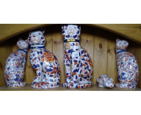 A pair of large Imari style cats, a similar smaller pair, and another (5)