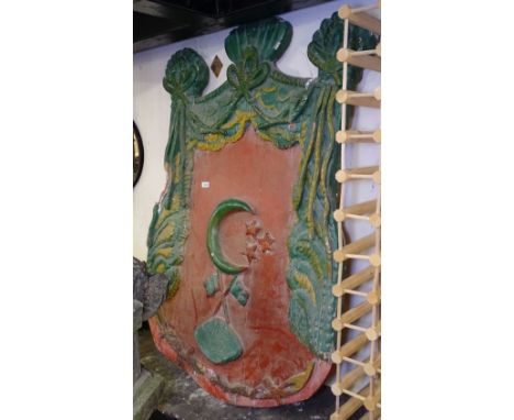 A large carved and painted wood Middle Eastern coat of arms, H150cm