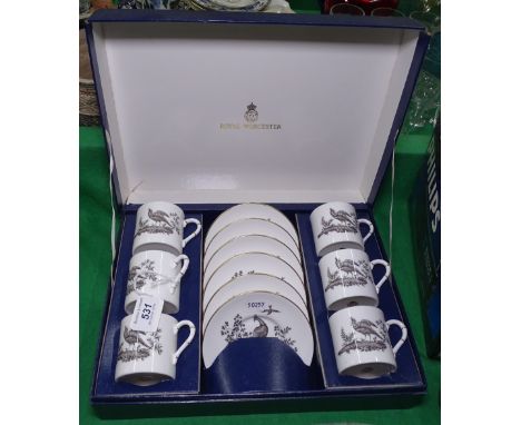 A Royal Worcester coffee set with bird decoration in presentation box