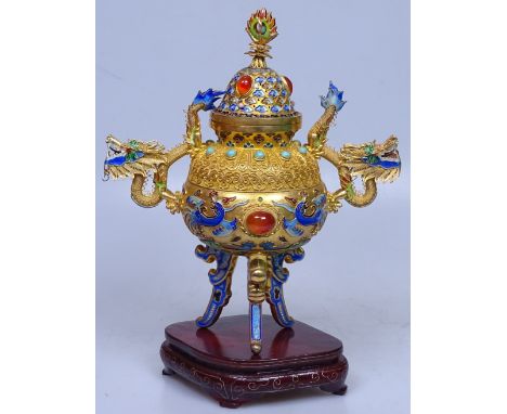 An ornate Chinese gilded silver and champleve enamel ornamental urn and cover, with filigree dragon handles, inset agate ston