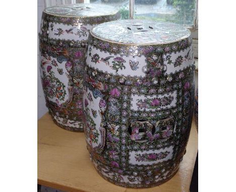 A pair of Chinese ceramic glazed barrel garden seats, H46cm, W28cm