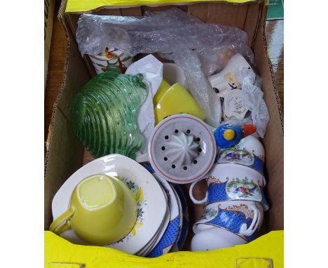 A lemon squeezer, egg cups, and Aynsley teaware