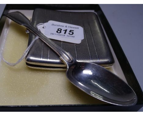 An engine turned silver cigarette case, Birmingham 1929, and a 19th century fiddle pattern teaspoon, 4oz