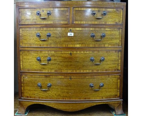 A reproduction cross-banded mahogany bow-front chest, with 2 short and 3 long drawers and bracket feet, W77cm