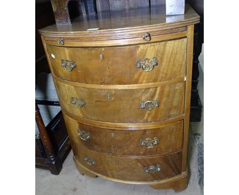 An Edwardian mahogany bow-front chest, with brushing slide and 4 drawers under, on bracket feet, W60cm, H79cm, D56cm