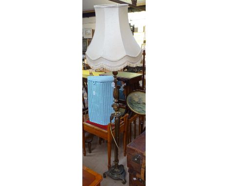 An ornate 19th century embossed brass standard lamp and shade, overall height 175cm