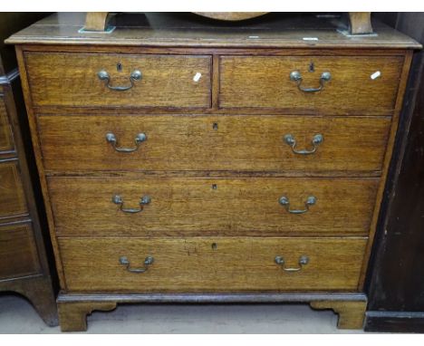 A Georgian oak chest of 2 short and 3 long drawers, on bracket feet, W100cm