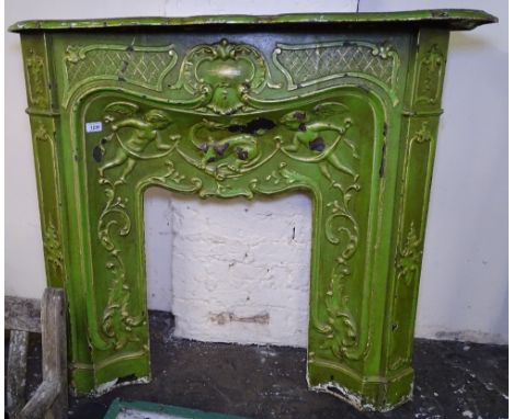 A Continental cast-iron Art Nouveau fire surround, with shaped mantel, overall width 103cm, height 98cm, inner width 44cm, he