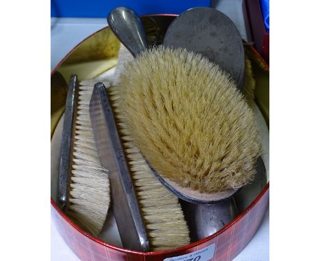 6 engine turned silver-backed dressing table brushes and mirrors