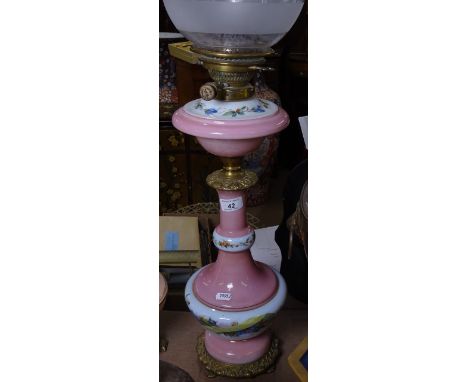 A Victorian Hink's duplex opaque glass and brass oil lamp, hand painted floral decoration and etched glass shade, height to t