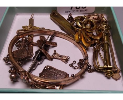 A box of Victorian jewellery including a fob, a crucifix, a chain etc