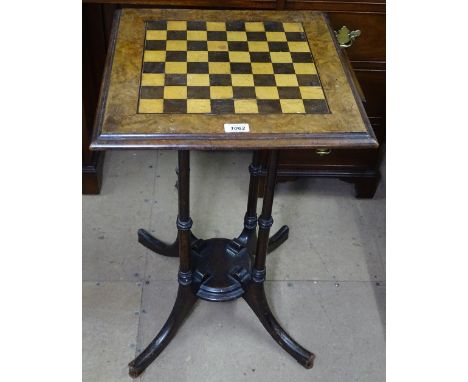 A Victorian walnut games top occasional table, raised on a quadruple column base, and a set of bone and ebony dominoes, table