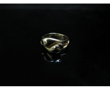 An 18ct gold snake ring. Size N, 7.5g 