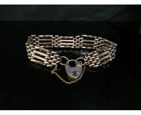 A 9ct rose gold gate bracelet with twisted and textured detail, 18.4g 
