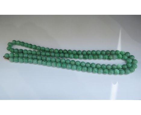 A jade bead necklace, each bead 5mm diameter, 100cm long 