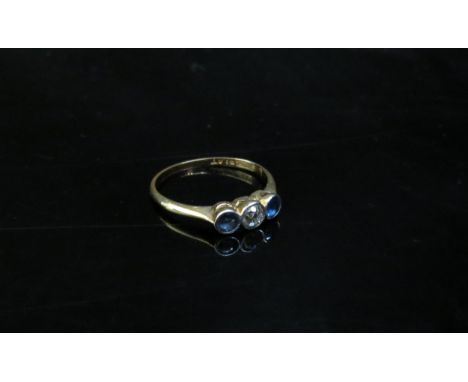 An 18ct gold platinum set diamond and sapphire ring. Size M/N, 1.8g 