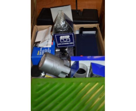 A box containing various photographic equipment including a lens light, Leica Hektor 85mm projector lens etc