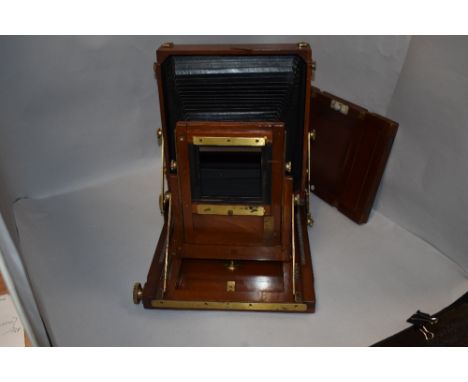 A mahogany Gandolfi whole plate camera. Comes with alloy case
Gandolfi stamped into wood, No splits in the wood, The 8.5inch 