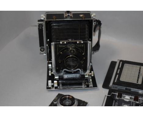 A Linhof Technika III field camera with Schneider Kreuznachlens and Mamiya Sekor lens etc