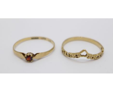 A 9ct gold and red stone ring and a yellow metal ring, 1.8g, P and O