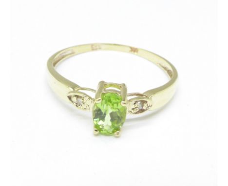 A 9ct gold, peridot and diamond ring, 1.1g, P