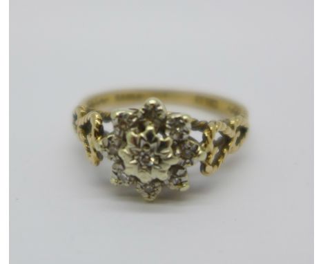 A 9ct gold and diamond ring, 2.5g, N