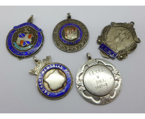 Five silver fobs, four with enamel decoration, 46g
