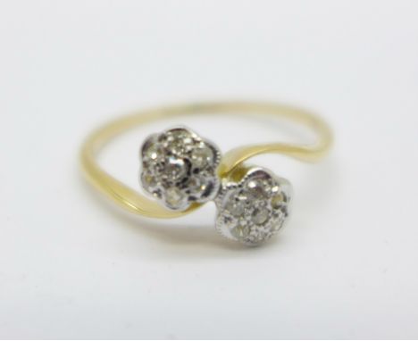 An 18ct gold, platinum set double diamond cluster ring, 1.9g, N