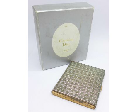 A Christian Dior compact, boxed