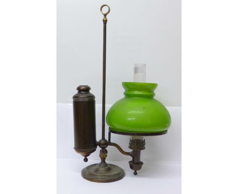 An oil lamp with carrying handle
