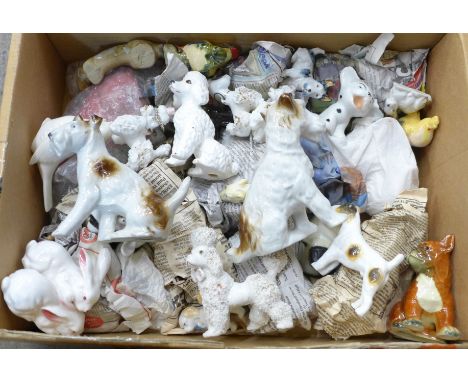 A collection of small pottery animals including Goebel boxer, chip to ear