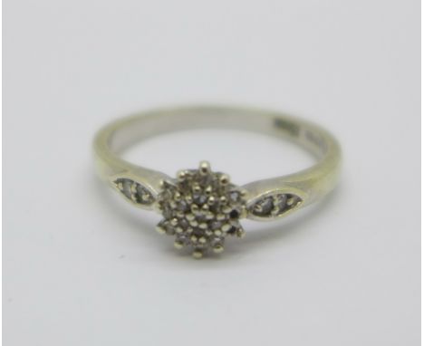 A 9ct gold and diamond ring, 2.2g, O, lacking two stones