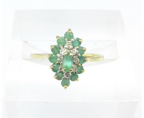 A 9ct gold, diamond and emerald ring, 1.3g, L