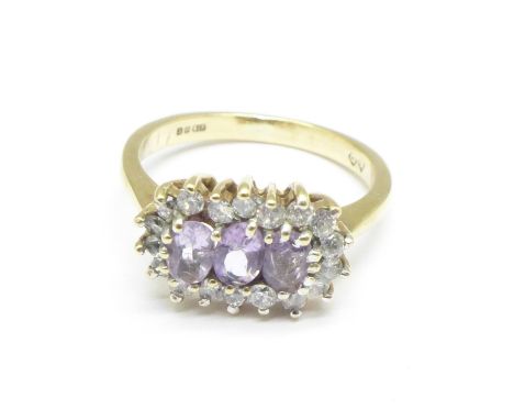 A 9ct gold, amethyst and zircon ring, 2.9g, K