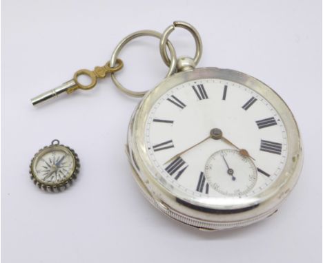 A silver fusee pocket watch, Birmingham 1892 with watch key and a Victorian silver compass charm
