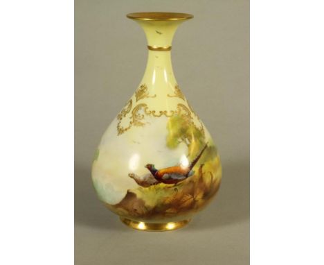 A ROYAL WORCESTER "HADLEY WARE" VASE, 1905, of onion form painted in polychrome enamels with a brace of pheasants in open lan