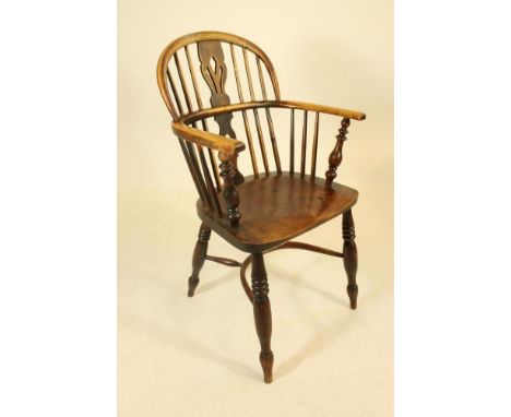 AN ASH AND ELM WINDSOR ARMCHAIR, early/mid 19th century, of low hoop back form with shaped pierced splat, baluster turned arm