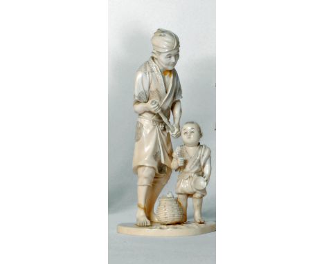 A JAPANESE SECTIONAL IVORY OKIMONO, Meiji period, of a fisherman wearing stained and engraved robes, holding a bamboo stick, 