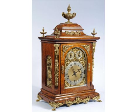 A VICTORIAN OAK CASED TABLE CLOCK, the "Winterholder & Hoffmeier" three train chiming movement  striking on five gongs and ei