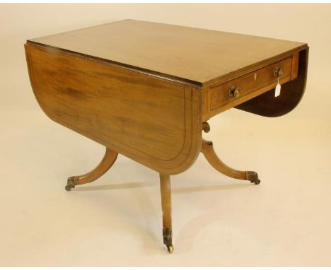 A REGENCY MAHOGANY PEMBROKE TABLE, 18th century, of rounded oblong form with stringing, banded top, frieze drawer with turned