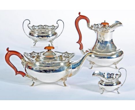 A COMPOSITE SILVER FOUR PIECE TEA AND COFFEE SERVICE, maker's mark E & D & Co., Birmingham 1923 (coffee pot), 1925 (teapot) a