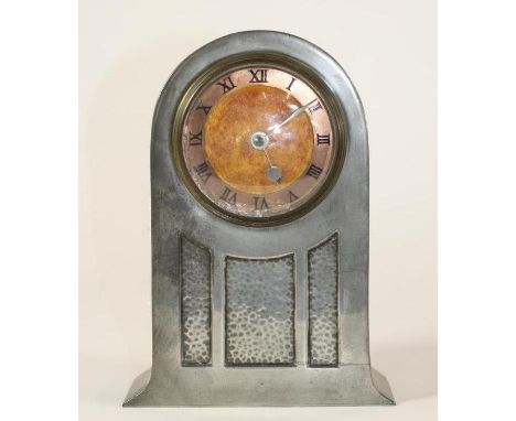 A LIBERTY & CO. "TUDRIC" PEWTER MANTEL CLOCK, the French spring movement with 3 1/4" dial, copper chapter ring with Roman num