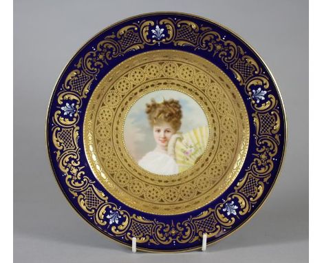 A VIENNA PORCELAIN CABINET PLATE, late 19th century, of plain circular form, centrally painted in pastel colours by H. Reldat