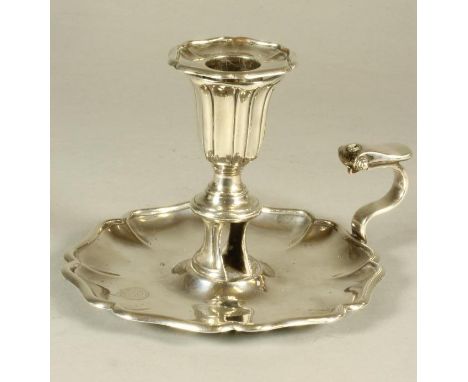 A WILLIAM IV SILVER CHAMBERSTICK, maker Henry Wilkinson, Sheffield 1835, the lobed detachable drip pan in a reeded tulip shap