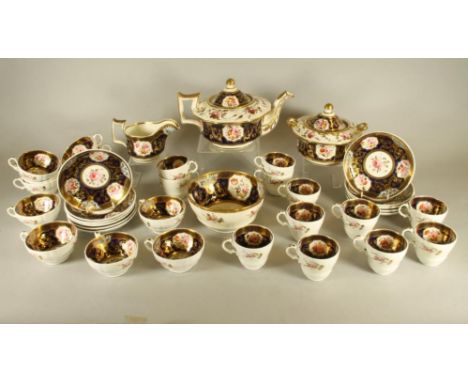 AN ENGLISH PORCELAIN TEA AND COFFEE SERVICE, c.1825, painted in polychrome enamels with panels of summer flowers within gilt 