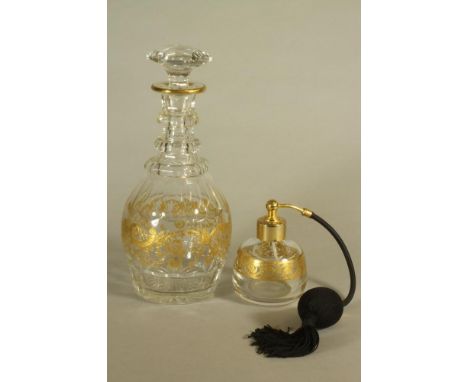 A ST LOUIS CRISTAL TRIPLE RING NECK DECANTER AND STOPPER, 20th century, with gilded rococo scroll banding, 10 1/4" high, toge