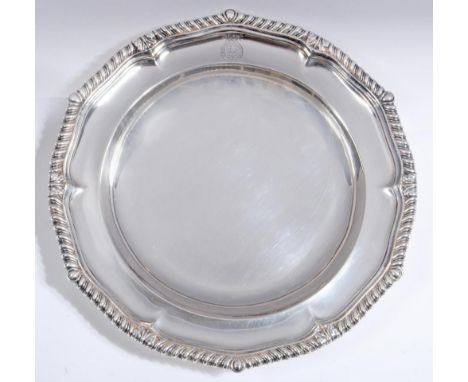 A LATE GEORGE III SILVER SOUP PLATE, maker Paul Storr, London 1809, of lobed circular form with everted gadrooned rim with ac